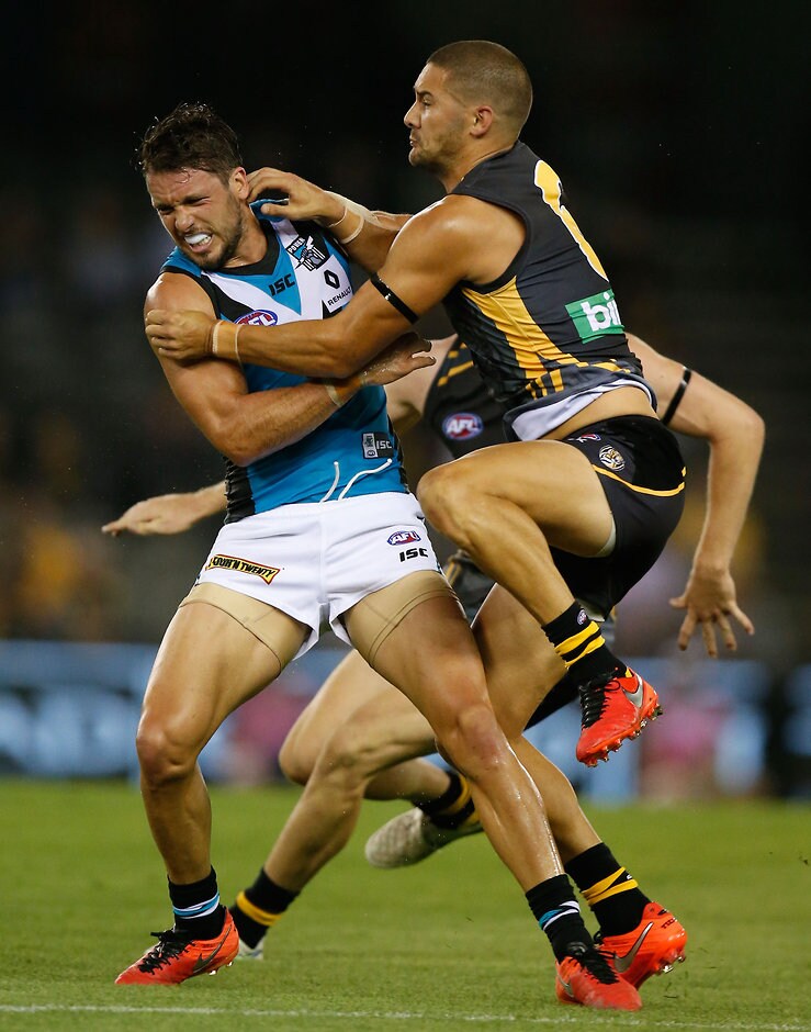 AFL 2016 NAB Challenge - Richmond v Port Adelaide Travis Boak and Shaun Grigg collide on Thursday night at Etihad Stadium - ${keywords}